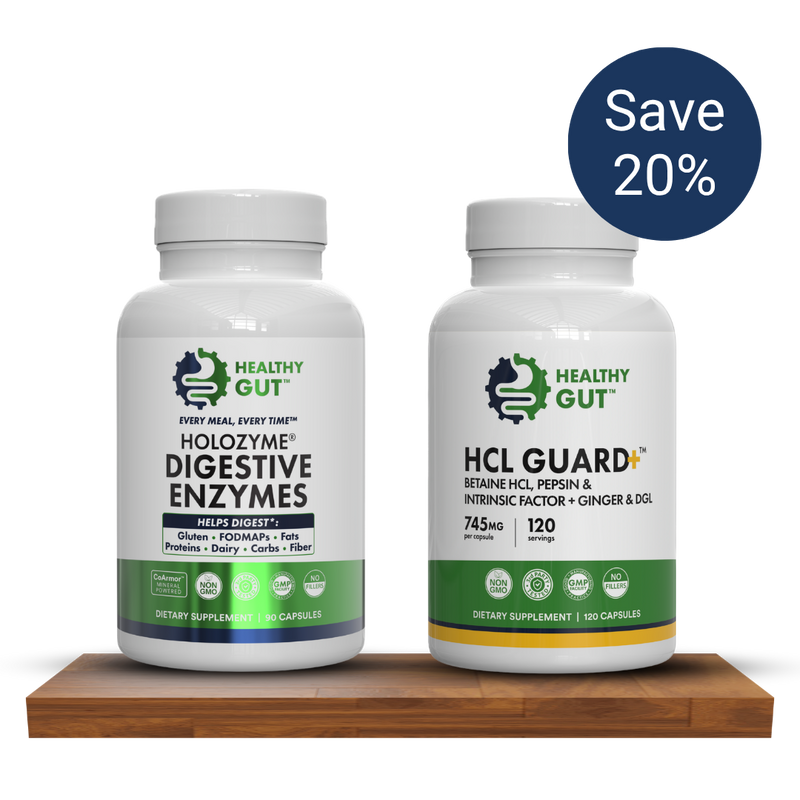 Front view of Set The Table Bundle with HoloZyme and HCL Guard Plus bottles, Save 20 percent badge, on a wooden table