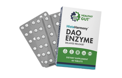 Three-quarter view of HistaHarmony DAO Enzyme box with blister pack of tablets on white background
